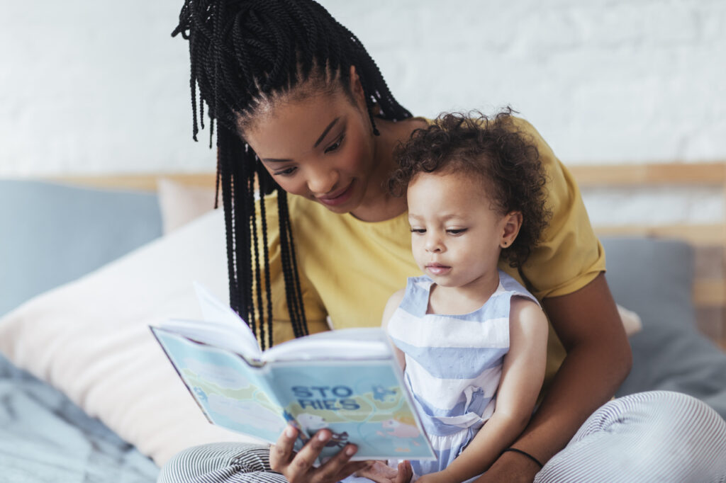 Mum reading to daughter